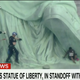 Illustration for article titled Woman Arrested on 4th of July After Climbing the Base of the Statue of Liberty in Protest of Migrant Family Separations
